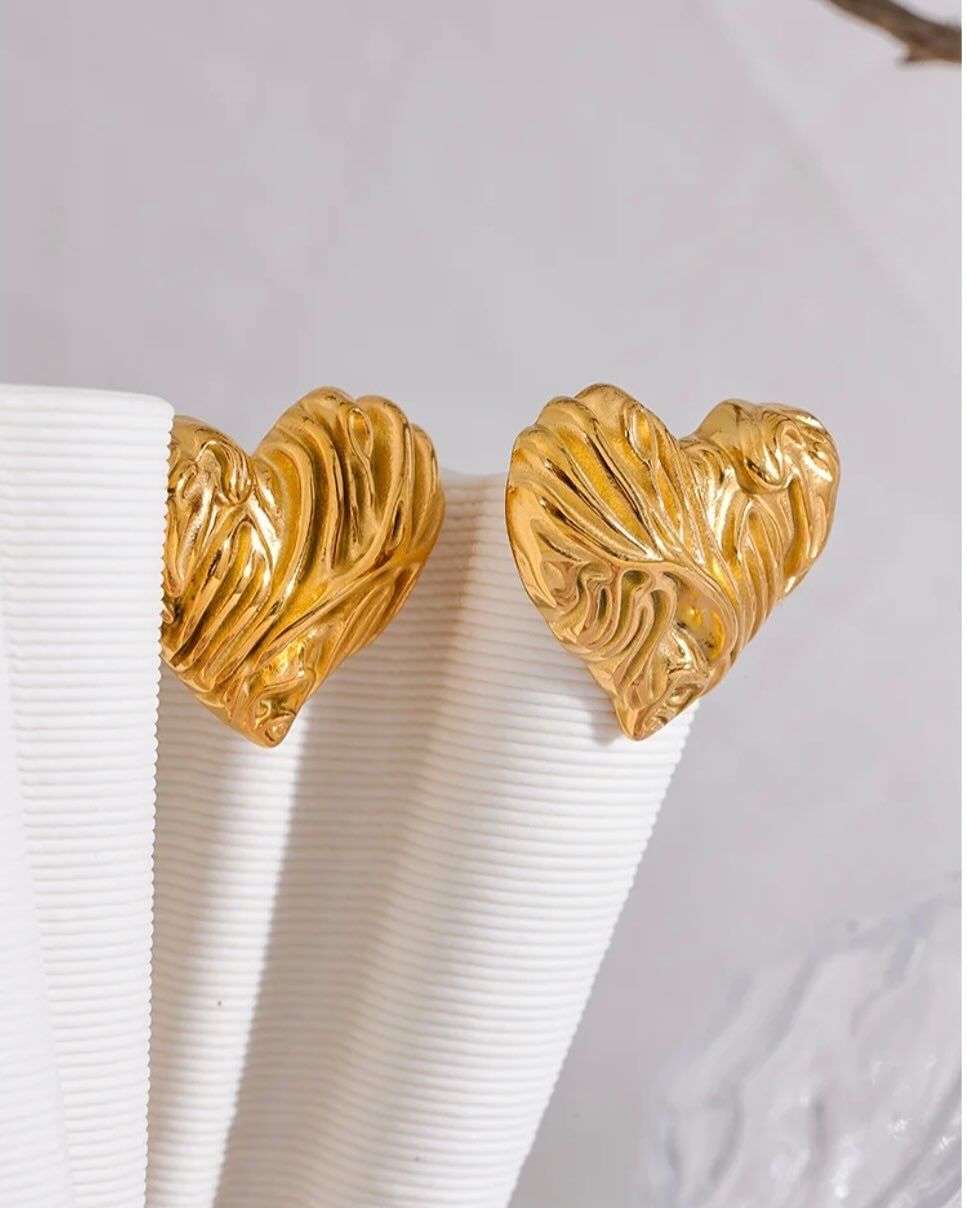 Close-up of molten gold texture on 18kt gold plated heart studs – luxury handcrafted earrings India